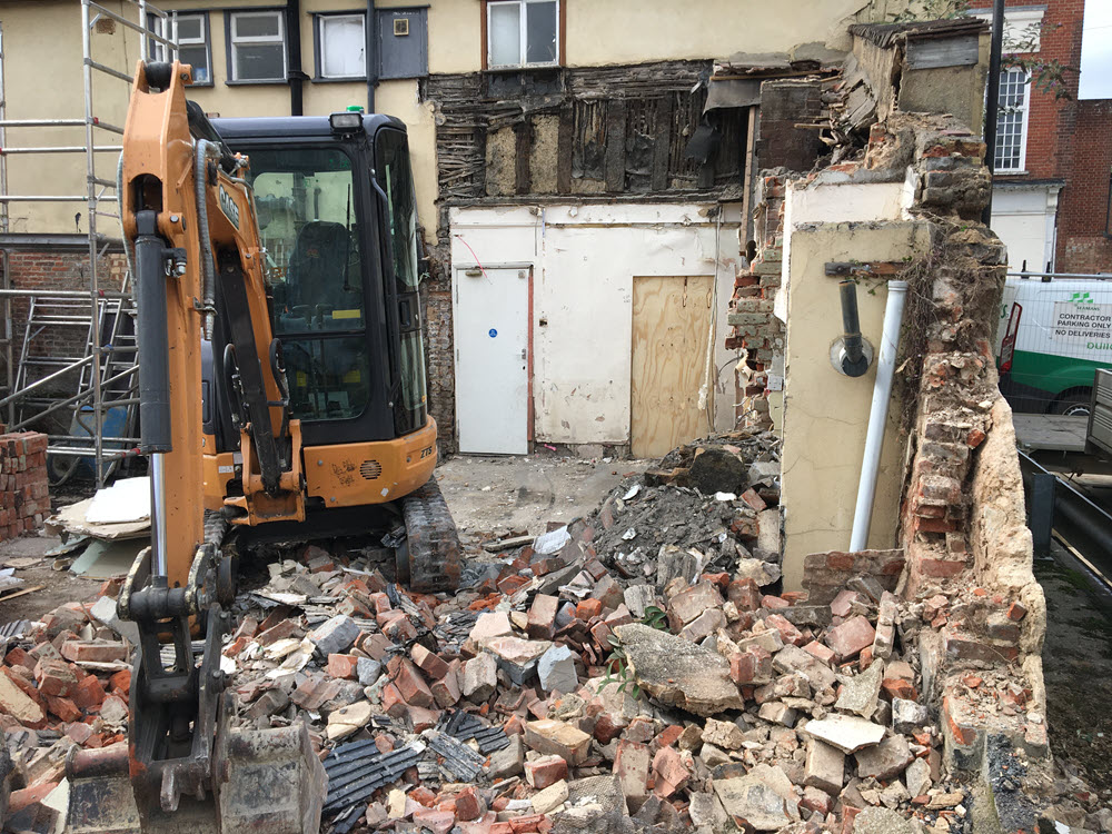 Demolition of extension to listed building in Bury St Edmunds