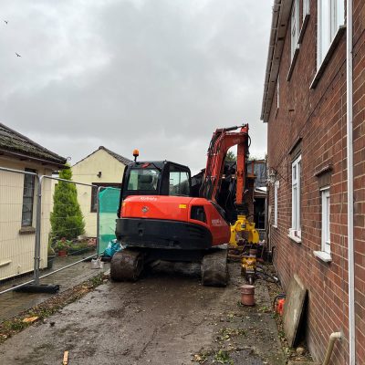 Demolition of garage and outbuilding underway in Burwell