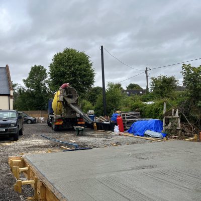 Concrete raft foundation poured on building site in Hitcham