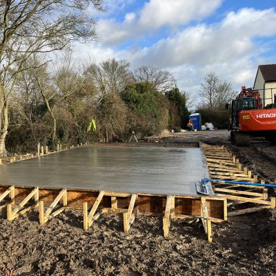 Concrete raft foundation prepared for annex building in Great Sampford