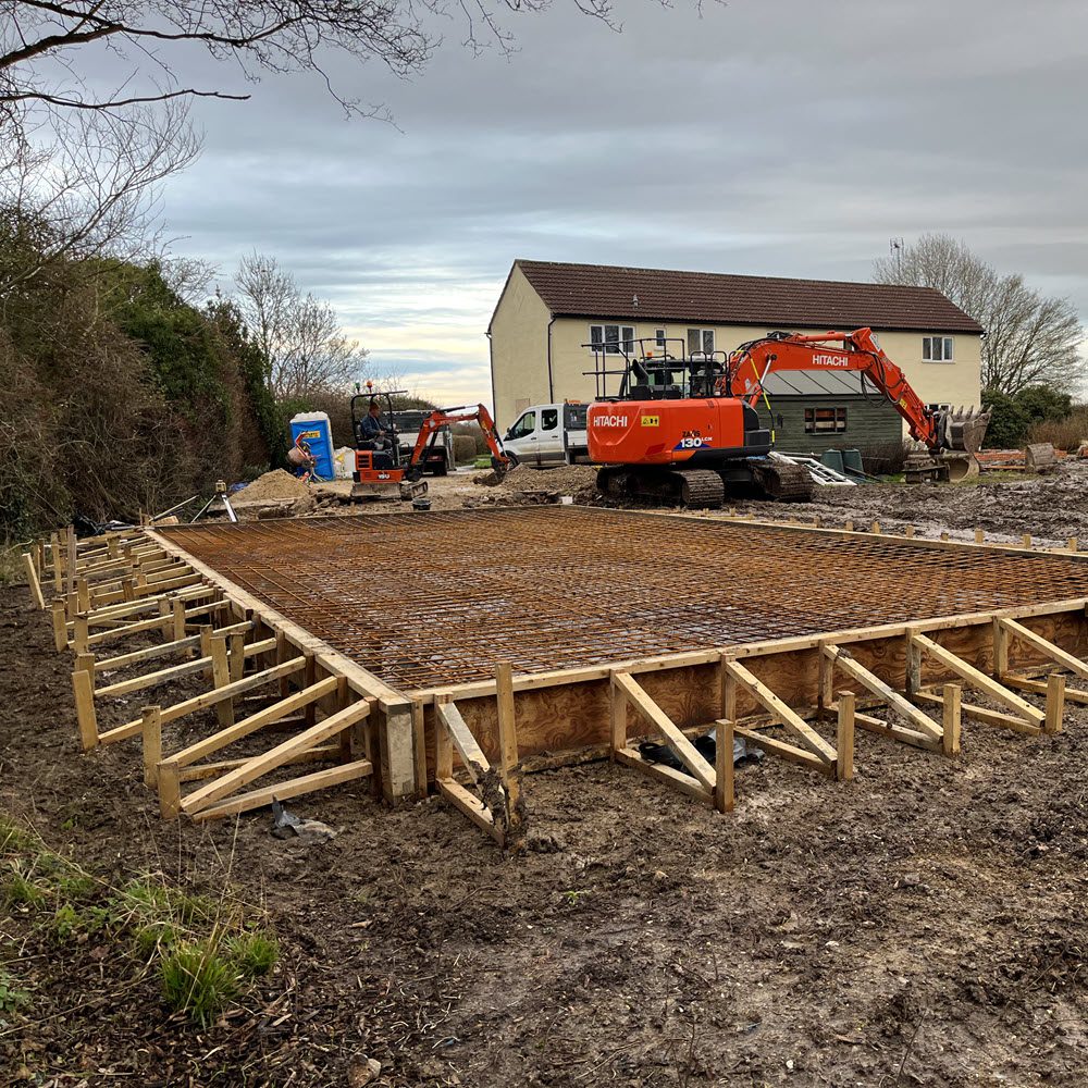 Concrete raft foundation prepared for annex building in Great Sampford