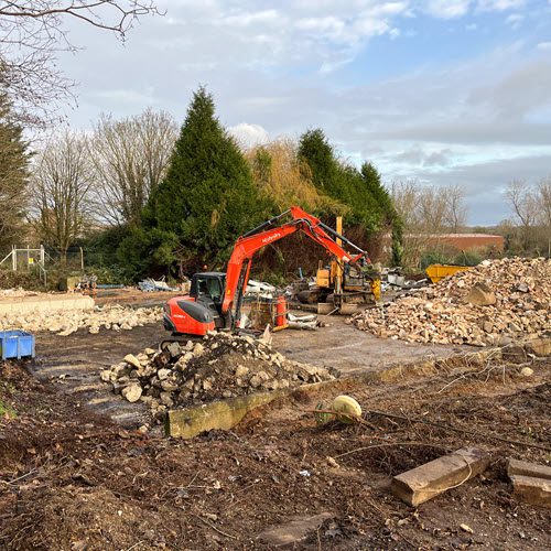 Removal of large water storage tanks and pipework during demolition project in Keddington