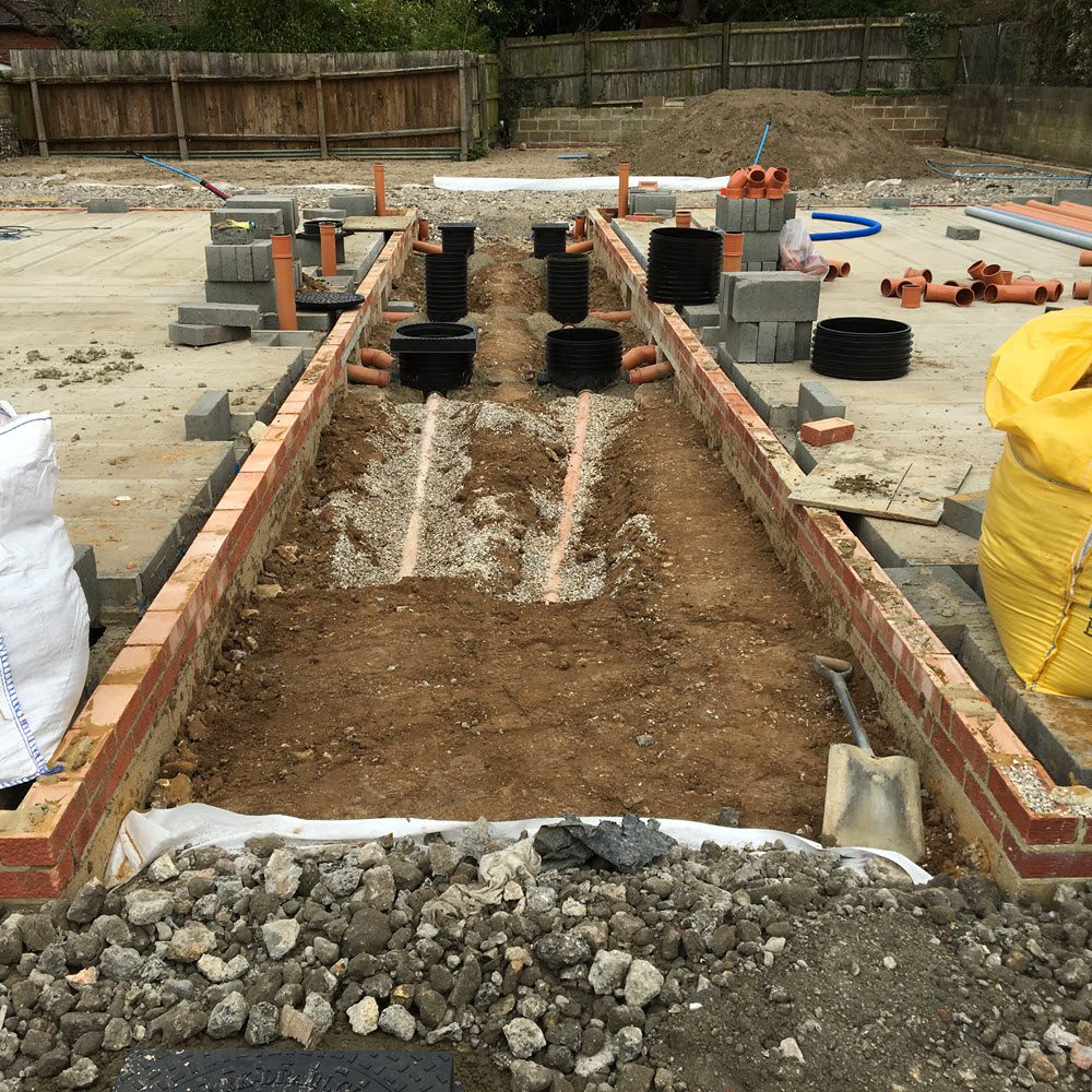 Groundworks for two new dwellings in Saffron Walden including foundations drainage and block and beam