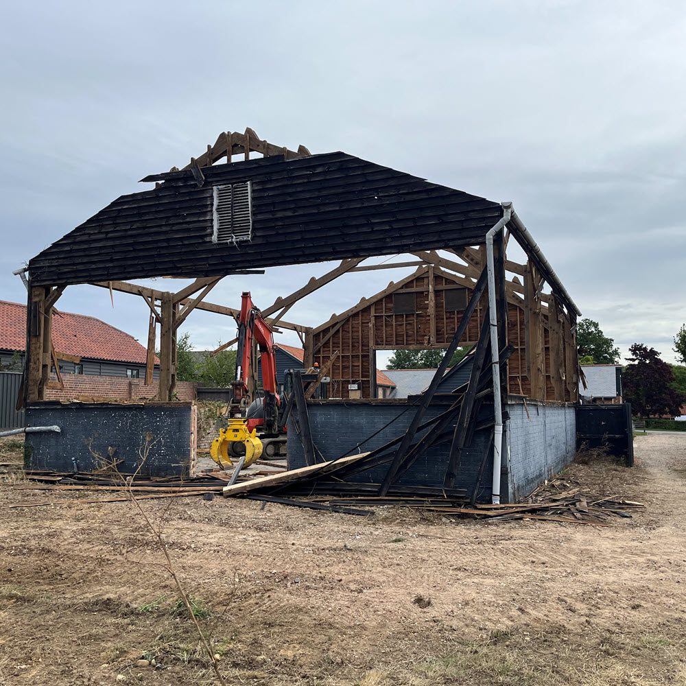 Farm building with asbestos sheeting before demolition in Cockfield, Suffolk