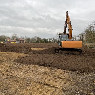 Landscape paddocks to the rear of new house and cart lodge buildings and driveways completed
