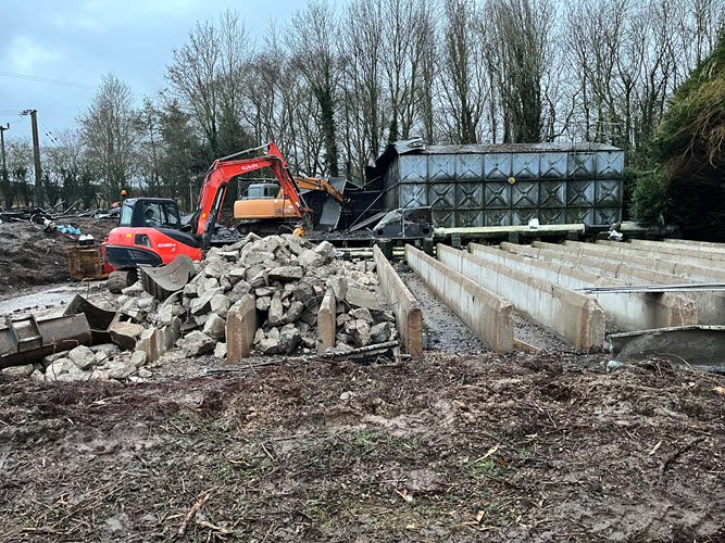 Removal of large water storage tanks and pipework during demolition project in Keddington