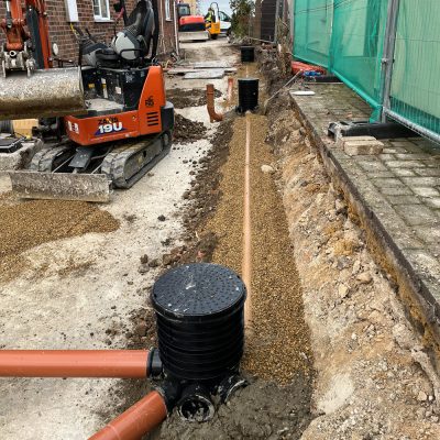 Installation of drainage and service ducts during groundworks in Burwell