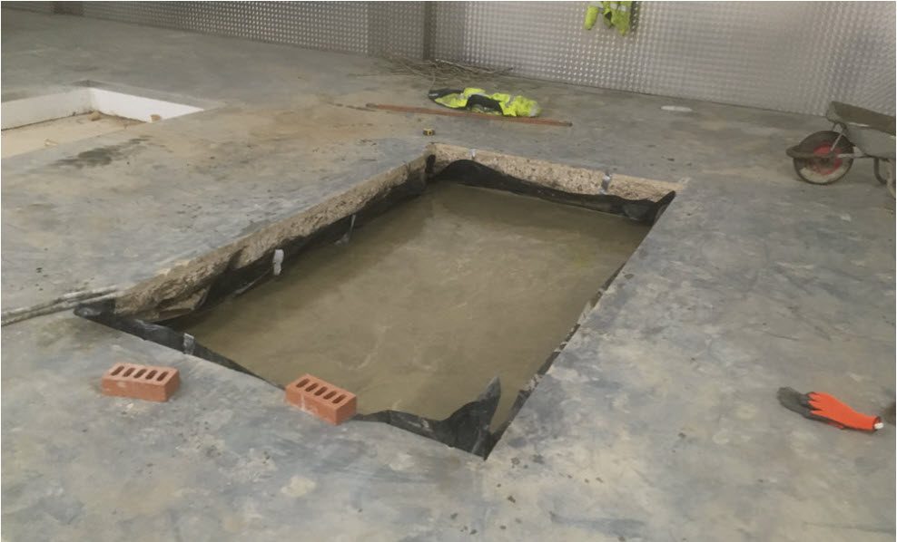 Newmarket - Breaking out reinforced concrete floor inside factory