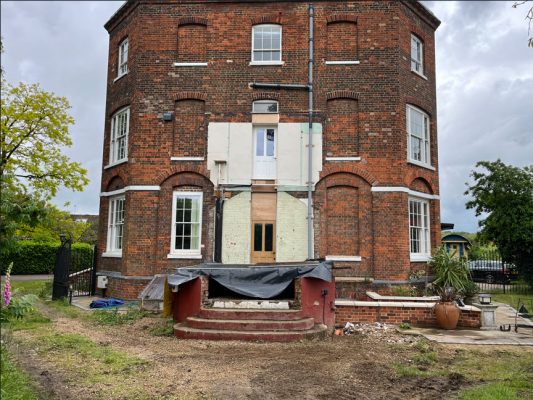 Cleared site after extension demolition in Bury St Edmunds