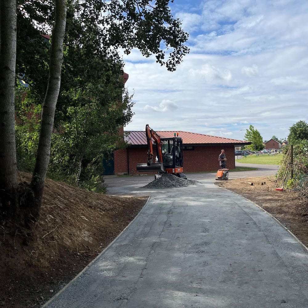 Footpath groundworks in Elmswell woodland with timber edging and Type 1 granite