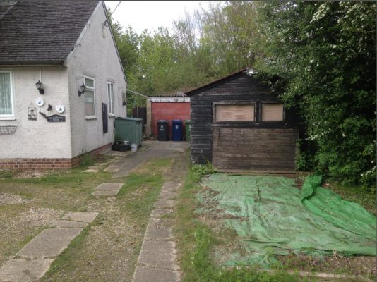 Bungalow and outbuildings before demolition in Haverhill