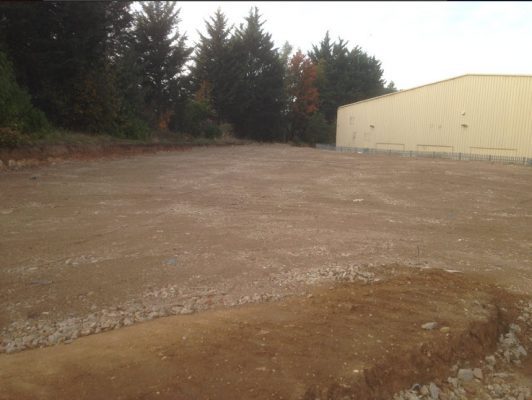 Preparation and compacting of tarmac planings for commercial car park