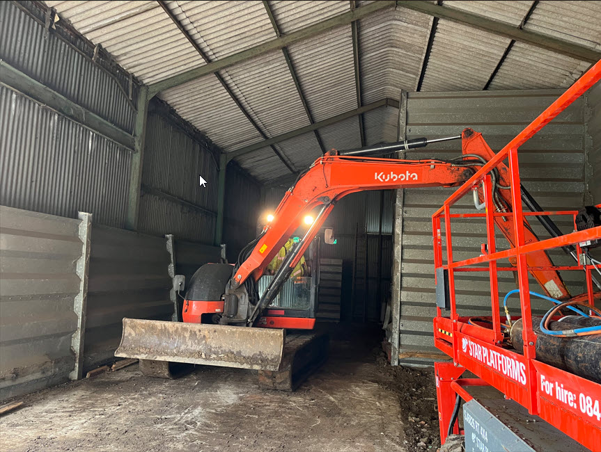 Grain bins before dismantling on farm in Stradishall