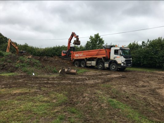 Tidying site for new dwelling in Wetherden
